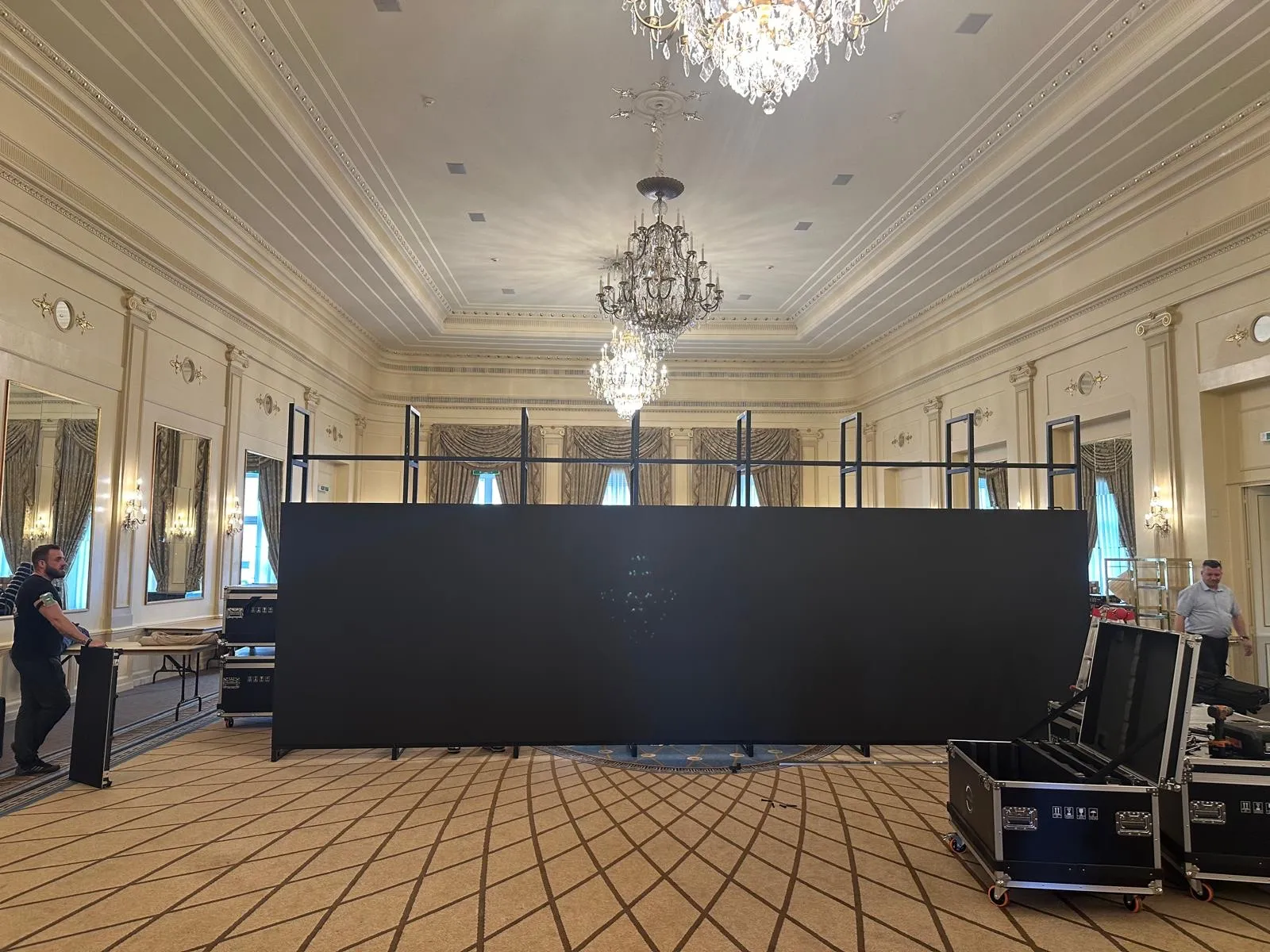 HYPERVISUAL crew assembling an LED wall on site