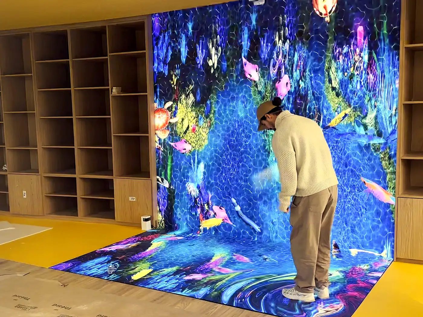 Interactive LED floor and wall forming one scene