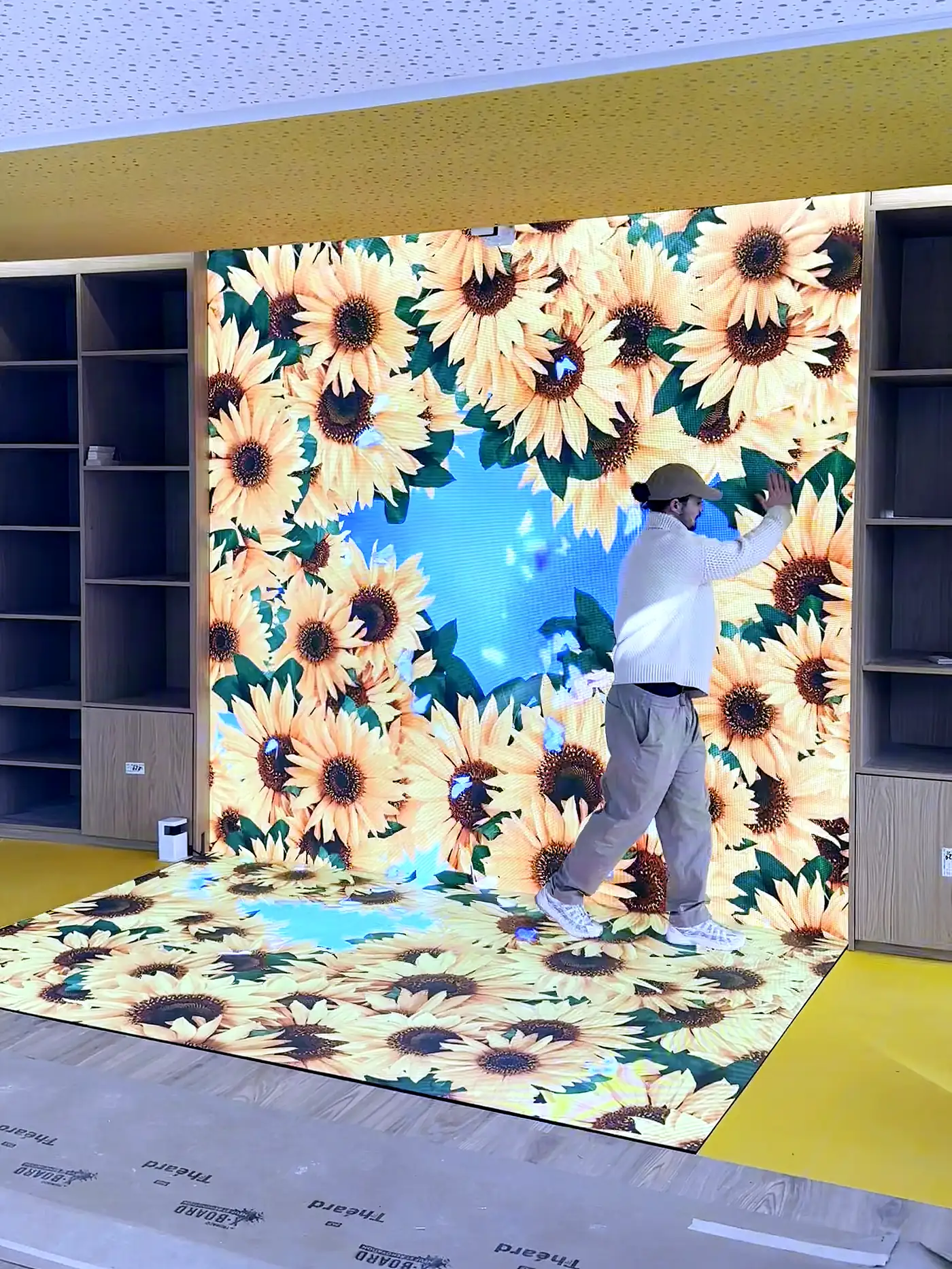 Interactive LED floor and wall forming one scene