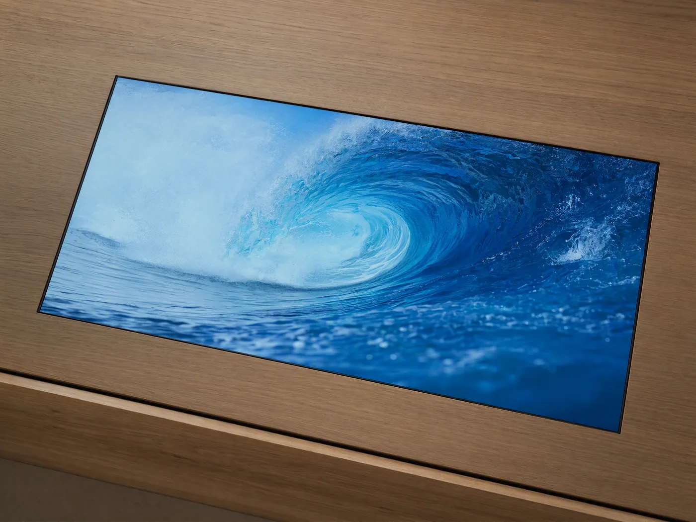 Open frame display built flush into a piece of furniture, only the picture showing