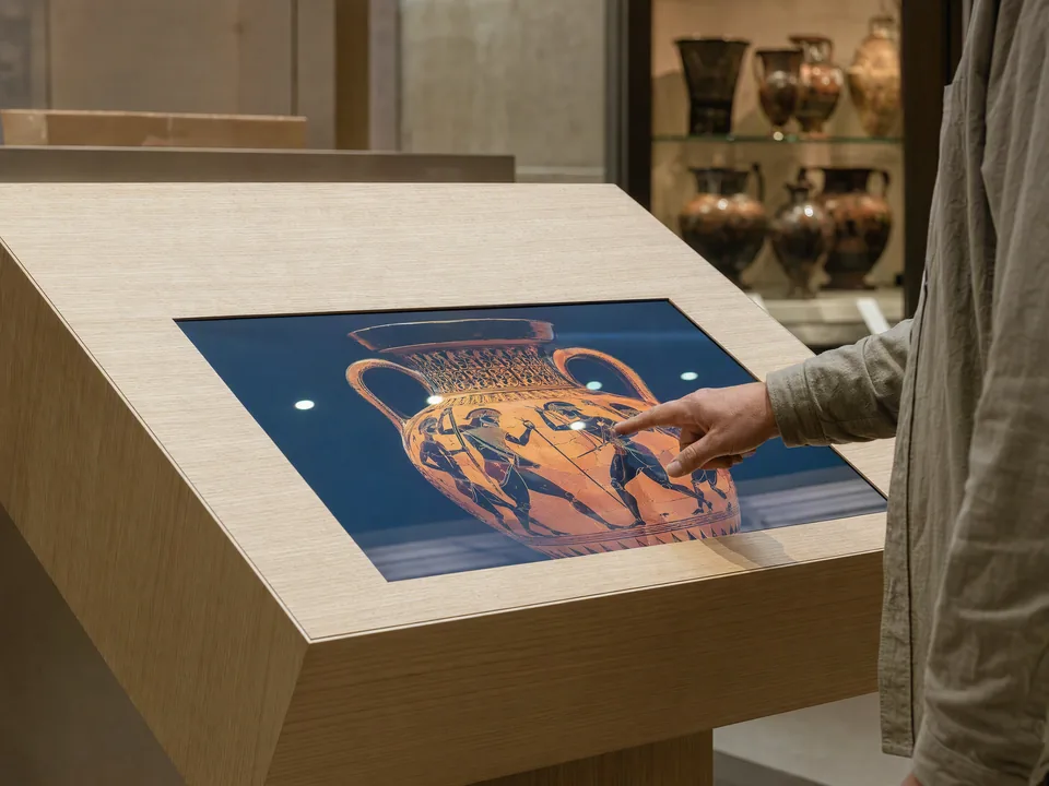 Open frame touch display built into a piece of furniture