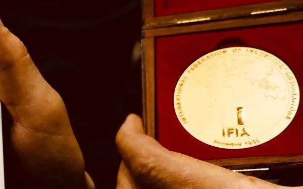 The IFIA gold medal in its case