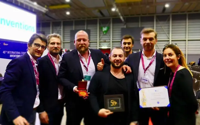 The HYPERVISUAL team at the 46th International Exhibition of Inventions of Geneva, with the certificate, the medal and the trophy